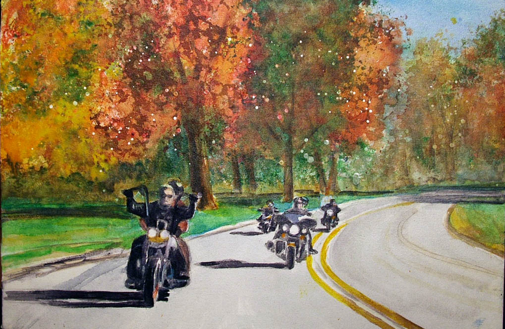 Fall color and a group of bikers on a ride